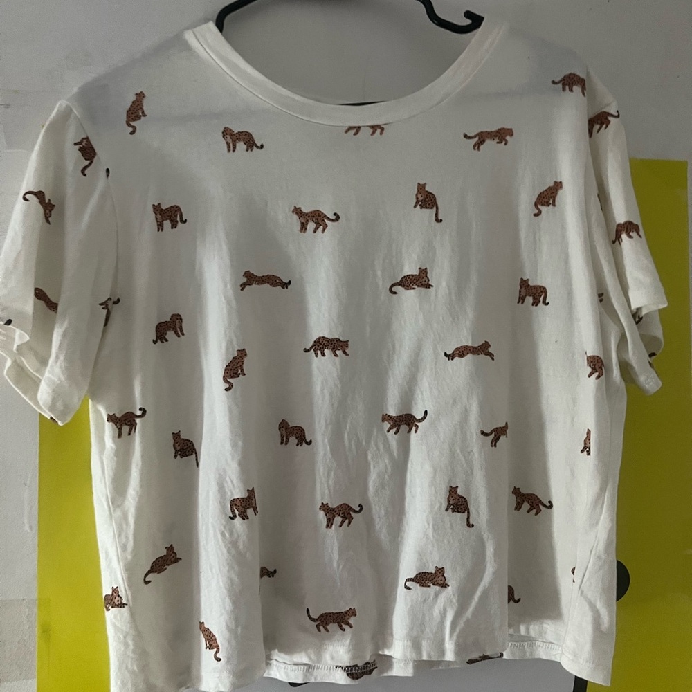 White shirt with leopards